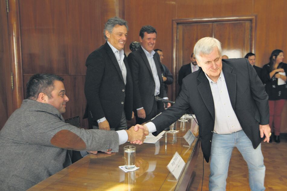 El ministro de Trabajo, Jorge Triaca, y el titular de la UOM, Antonio Caló.