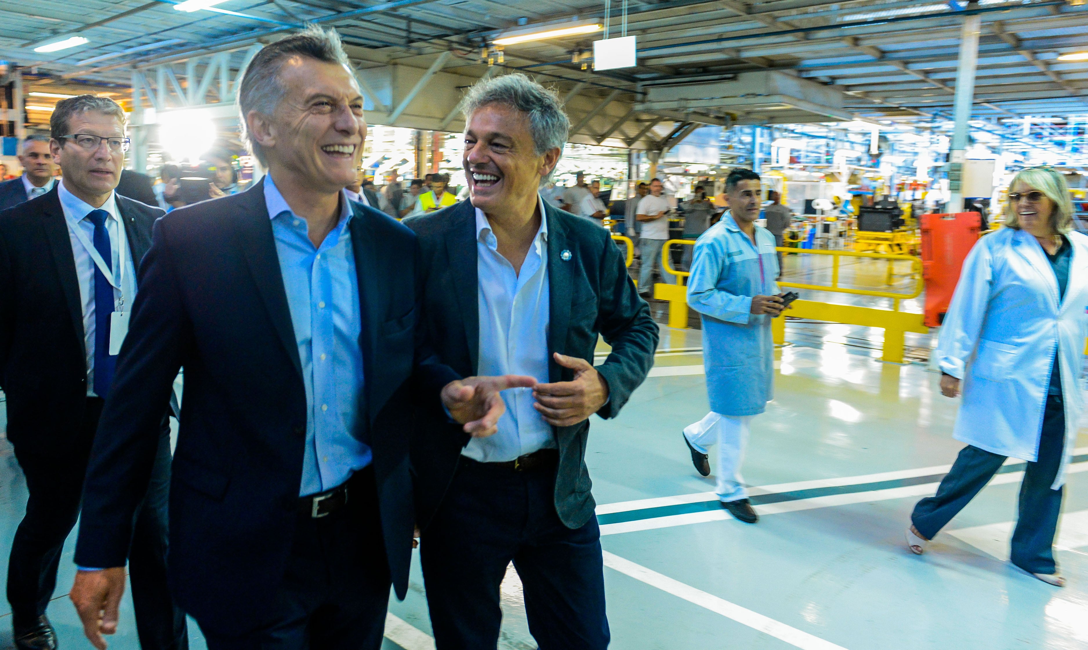 Macri no dejó de sonreir pese al mal momento que vivió con los trabajadores.