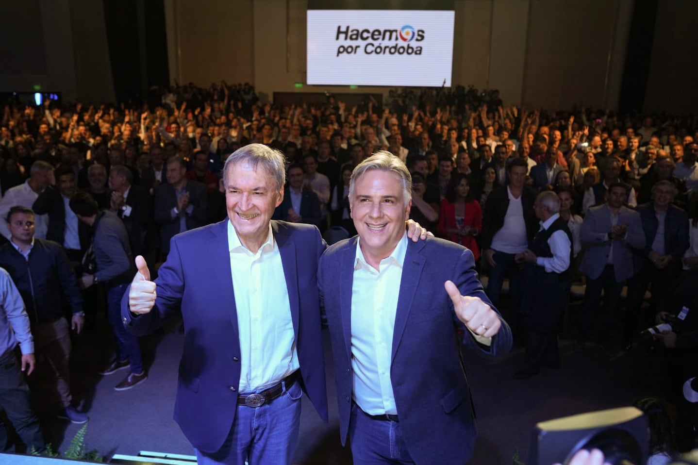 El gobernador saliente, Juan Schiaretti; y el mandatario electo, Martín Llaryora.