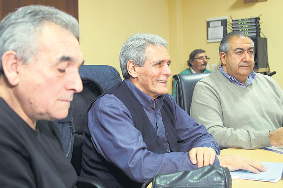 Los triunviros de la CGT Juan Carlos Schmid (portuarios), Carlos Acuña (garajes) y Héctor Daer (sanidad).