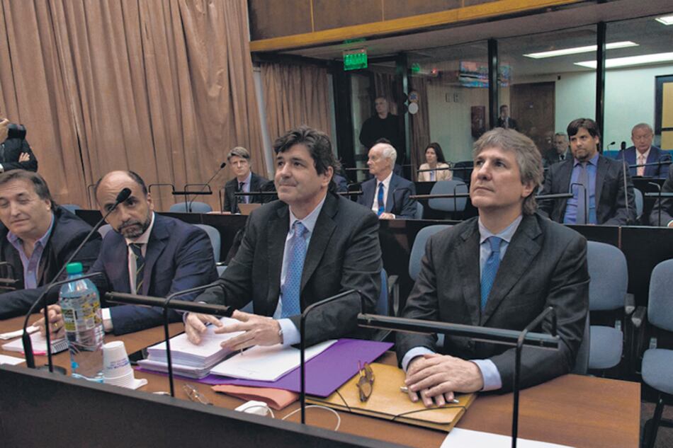 Amado Boudou, José María Núñez Carmona y, detrás, Alejandro Vandenbroele, tres de los imputados.