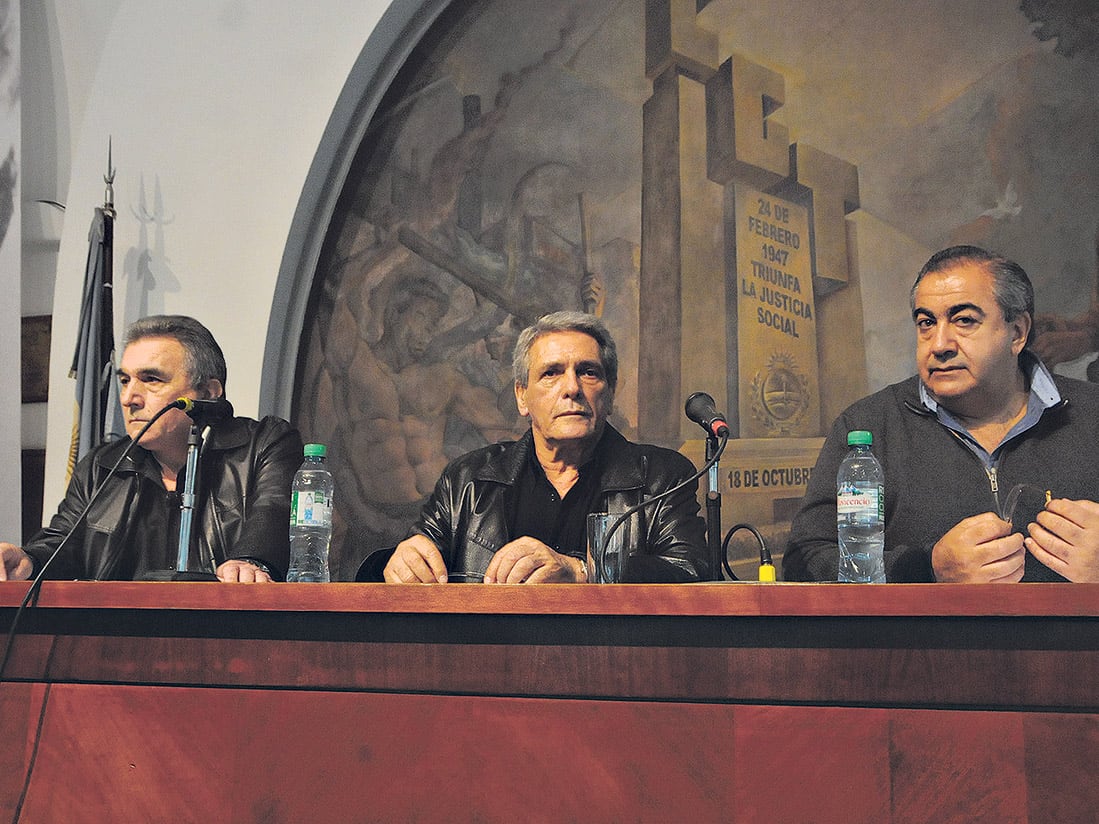La conducción de la CGT Juan Carlos Schmid, Carlos Acuña y Héctor Daer.