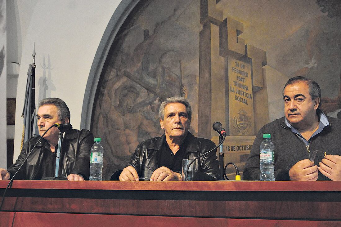 La conducción de la CGT Juan Carlos Schmid, Carlos Acuña y Héctor Daer.
