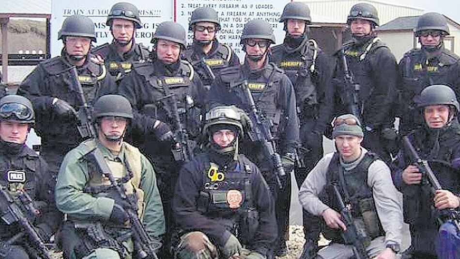 Mercenarios de Blackwater posan para la foto antes de partir a una misión en Medio Oriente.