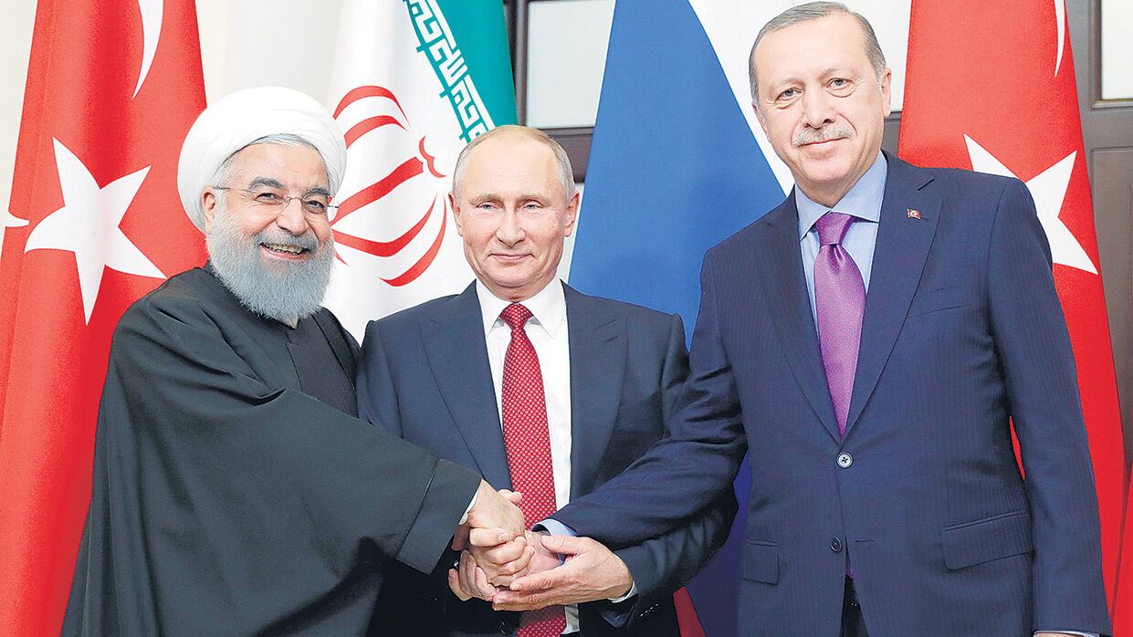 De izq. a der.: los presidentes Hassan Rohani (Irán), Vladimir Putin (Rusia) y Recep Tayyip Erdogan (Turquía).