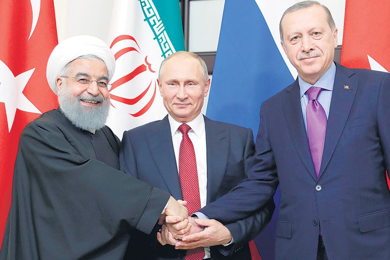 De izq. a der.: los presidentes Hassan Rohani (Irán), Vladimir Putin (Rusia) y Recep Tayyip Erdogan (Turquía).