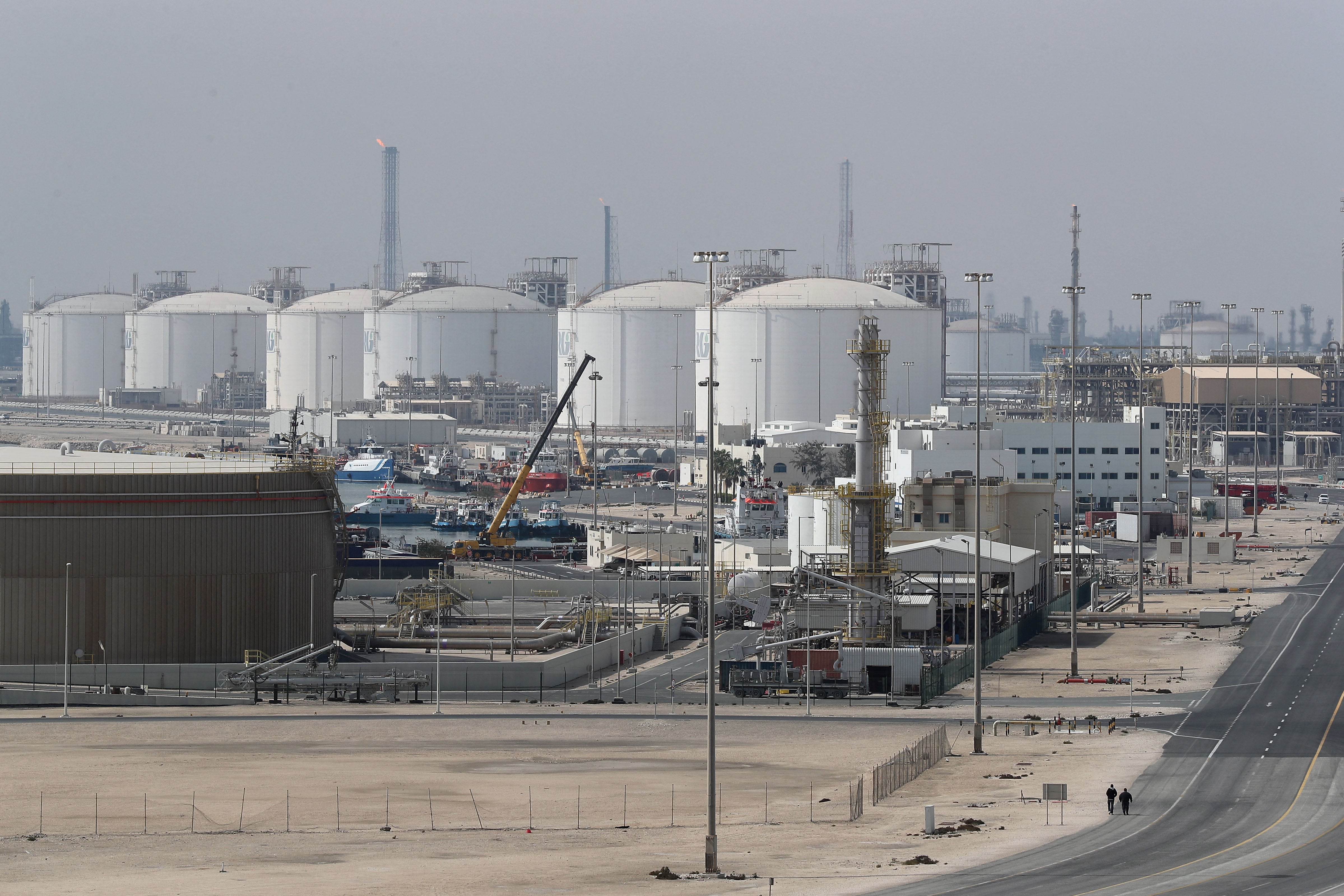 (FILES) This picture shows the Ras Laffan Industrial City, Qatar's principal site for production of liquefied natural gas and gas-to-liquid, administrated by Qatar Petroleum, some 80 kilometers (50 miles) north of the capital Doha, on February 6, 2017. Tehran on March 19, 2026, has carried out a series of attacks on Gulf energy sites, including on Qatar's huge Ras Laffan LNG facility, in retaliation for an Israeli strike on Iran's South Pars gas field -- part of the world's largest natural gas reservoir. (Photo by KARIM JAAFAR / AFP)