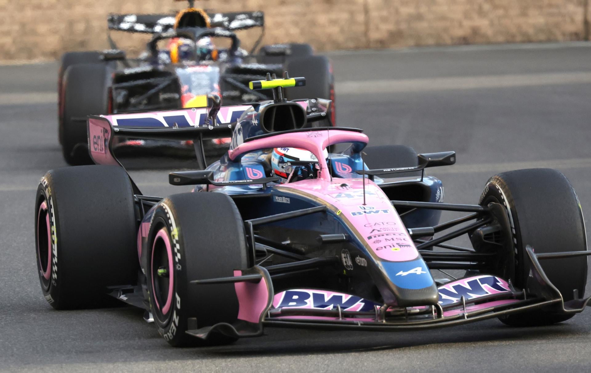 Alpine driver Franco Colapinto (Front) of Argentina and Red Bull Racing driver Max Verstappen (Back) of Netherlands in action during a practice session for the Formula One Azerbaijan Grand Prix in Baku, Azerbaijan