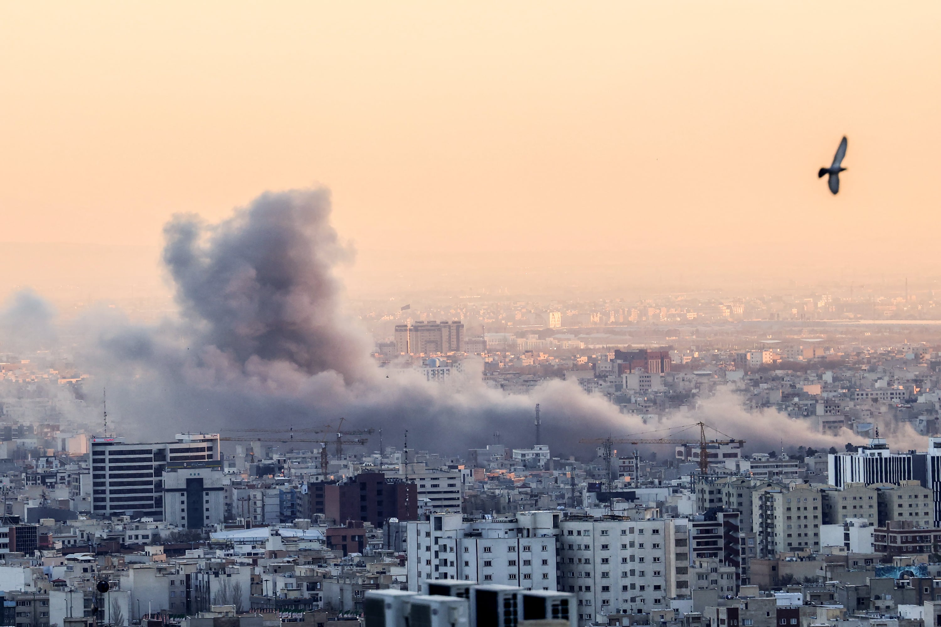 A plume of smoke rises after a strike on the Iranian capital Tehran, on March 3, 2026.