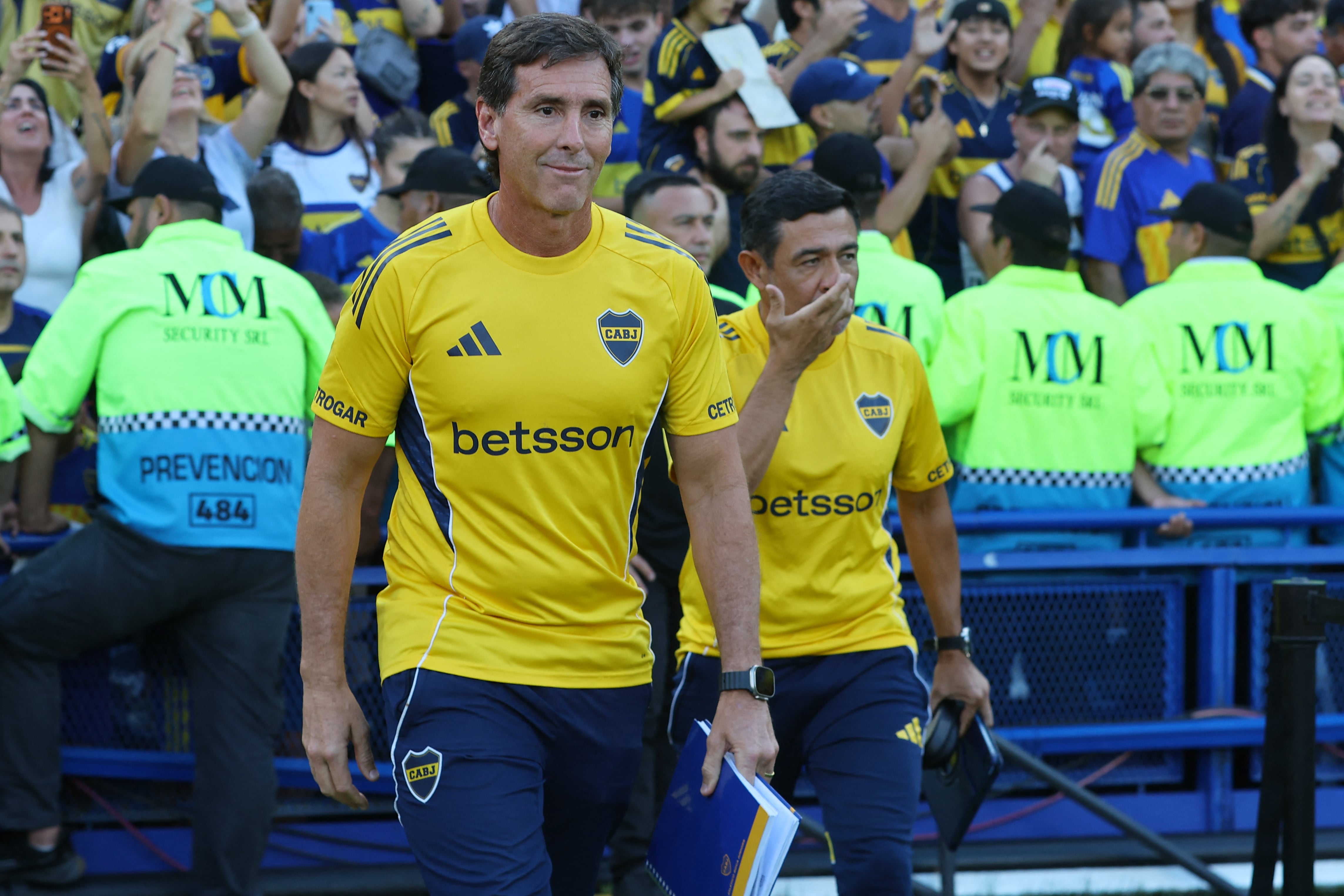 Boca Juniors' head coach Claudio Ubeda enters the pitch before the Argentine Professional Football League 2026 Apertura Tournament match between Boca Juniors and Newell's Old Boys at La Bombonera stadium in Buenos Aires on February 1, 2026. (Photo by ALEJANDRO PAGNI / AFP)
