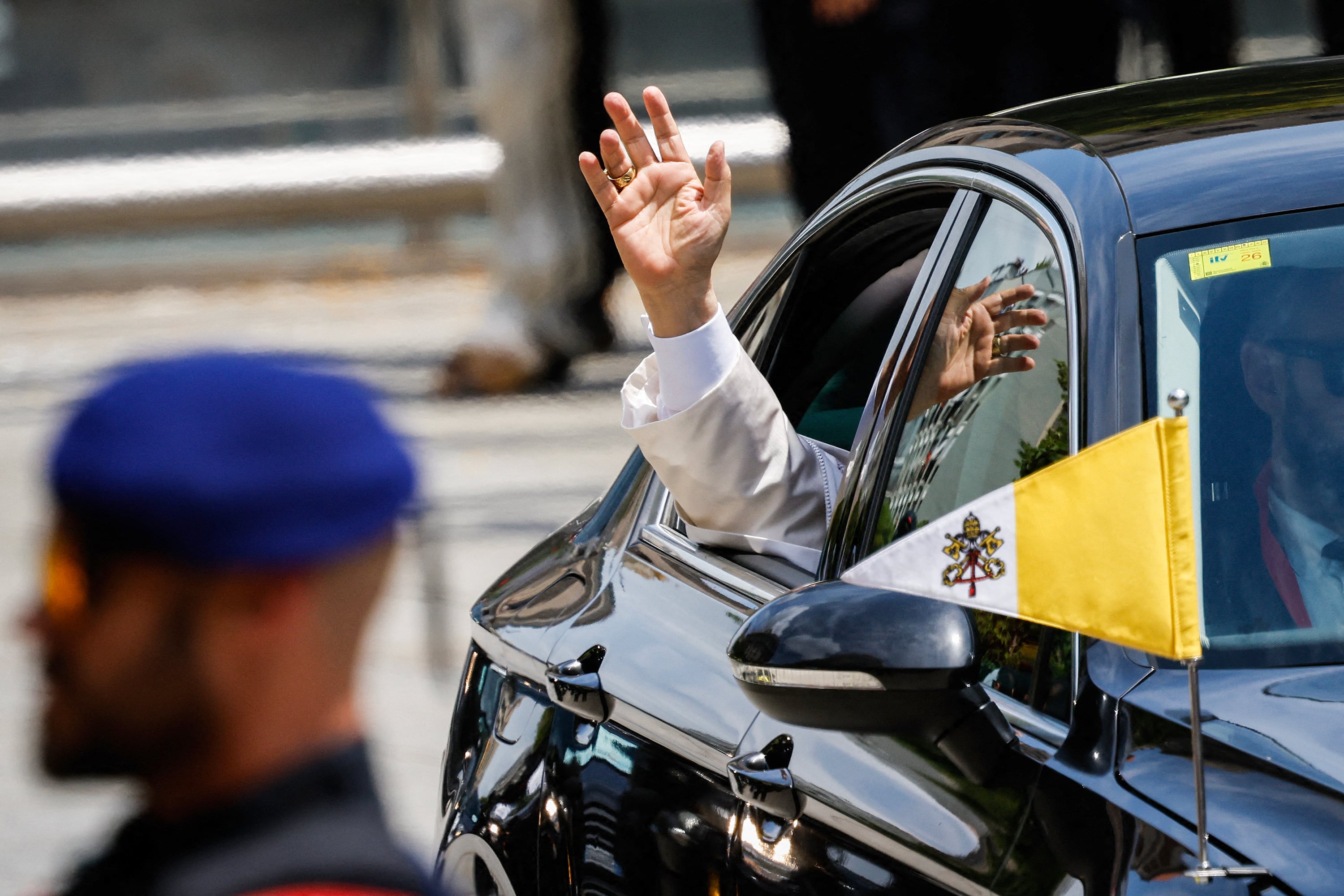 Pope Leo XIV waves as he arrives to hold a midday prayer in the Cathedral of the Holy Cross and Saint Eulalia in Barcelona, on June 9, 2026