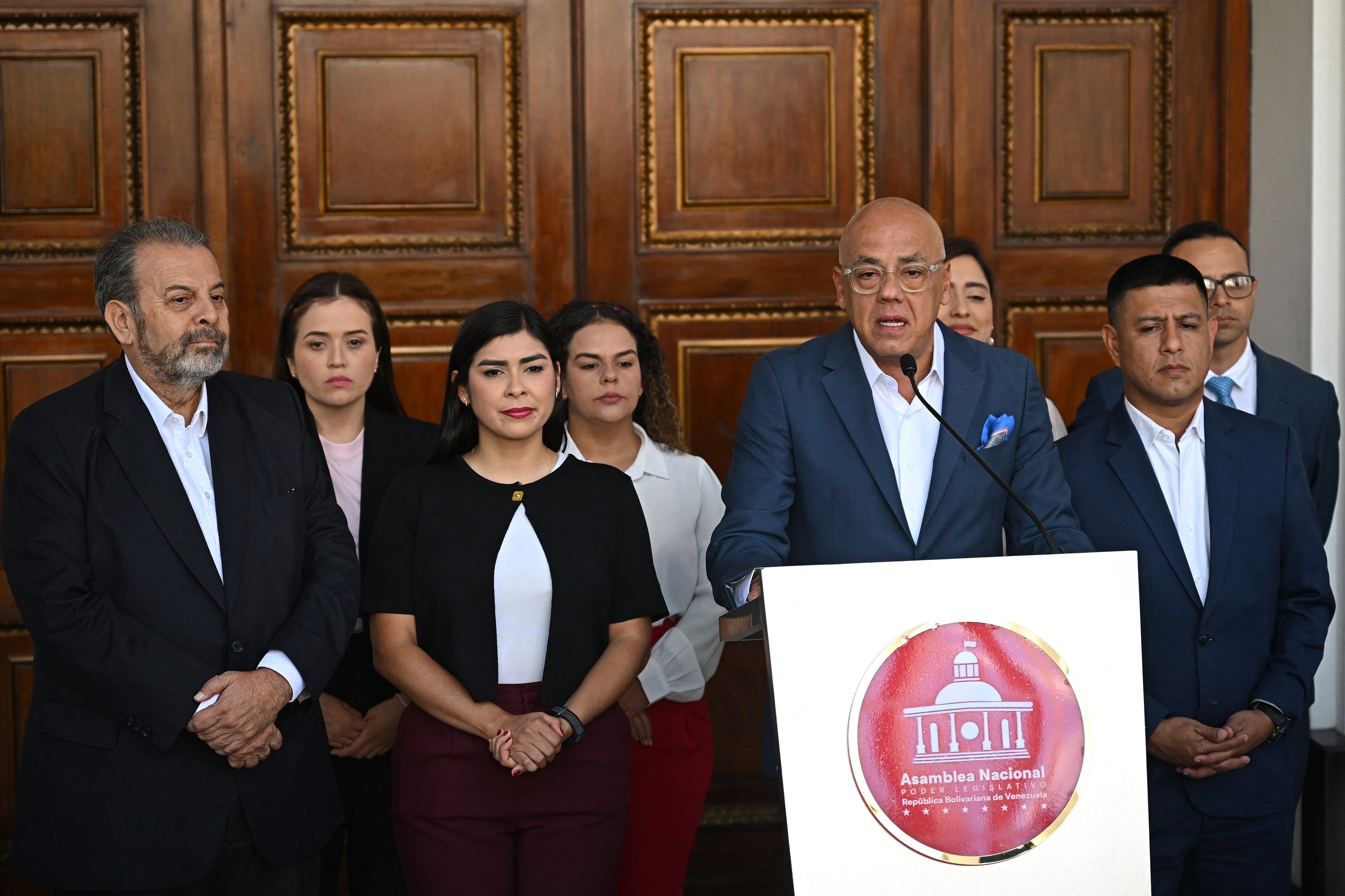 The President of the National Assembly of Venezuela Jorge Rodriguez speaks before the start of the National Assembly session in Caracas on January 8, 2026. Rodriguez announced the imminent release of a significant number of Venezuelans and foreign nationals "in order to contribute to and collaborate in the effort that we must all make to achieve coexistence". (Photo by Federico PARRA / AFP)