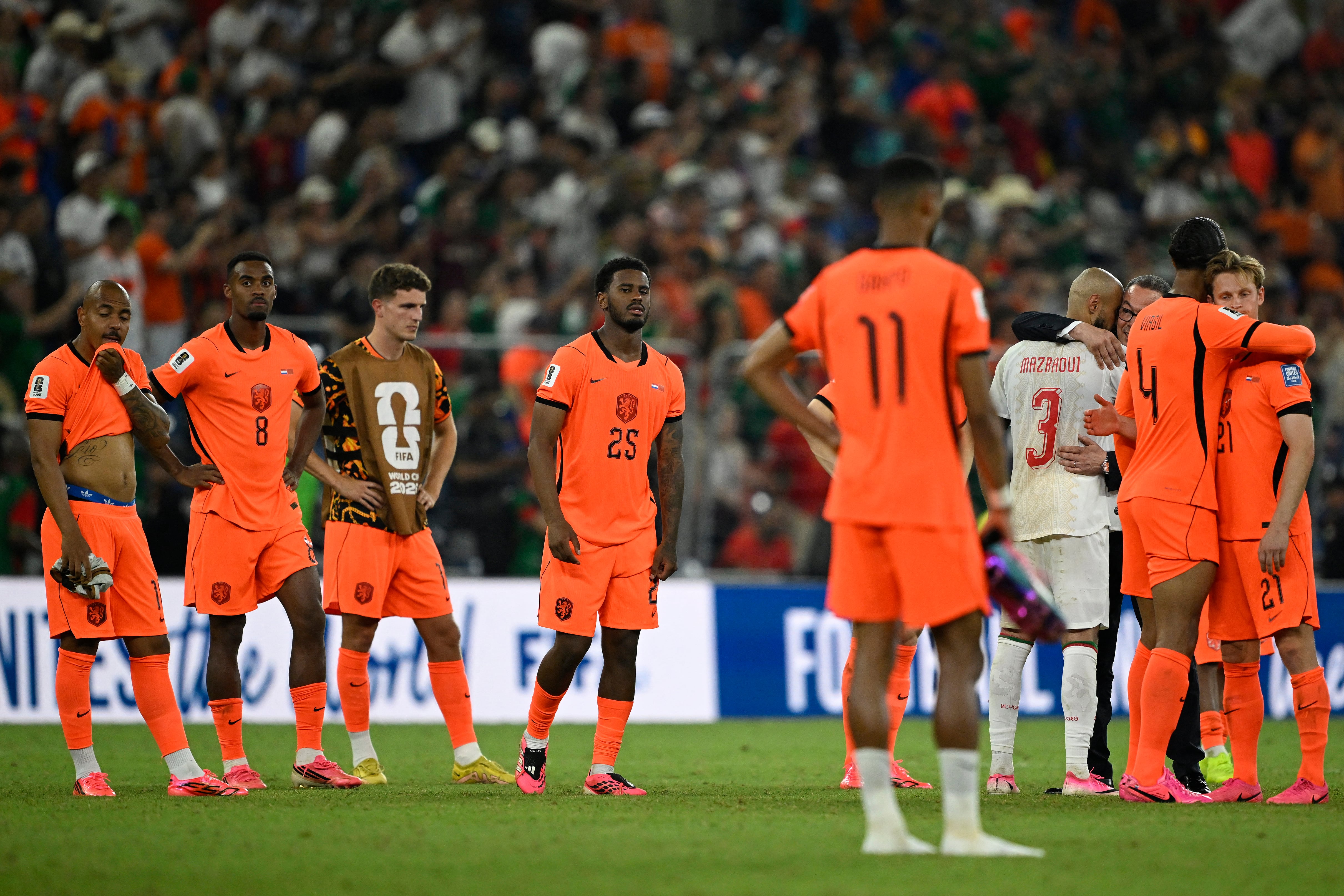 Netherlands players react after losing the penalty shootout of the 2026 World Cup round of 32 football match between the Netherlands and Morocco at the Monterrey Stadium in Guadalupe on June 29, 2026.  (Photo by Alfredo ESTRELLA / AFP)