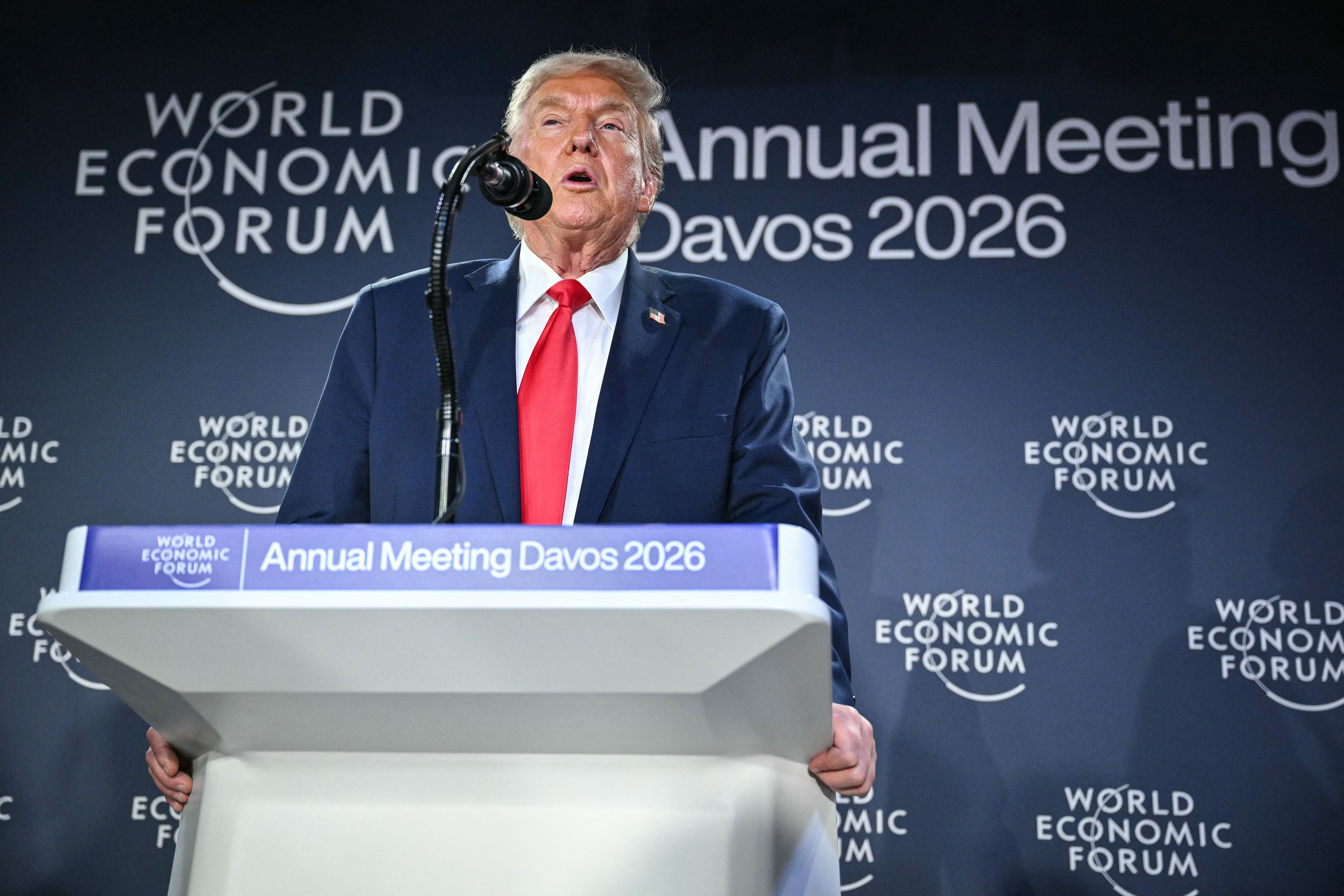 US President Donald Trump speaks during a reception with business leaders on the sidelines of the World Economic Forum (WEF) annual meeting in Davos on January 21, 2026. The World Economic Forum takes place in Davos from January 19 to January 23, 2026. (Photo by Mandel NGAN / AFP)