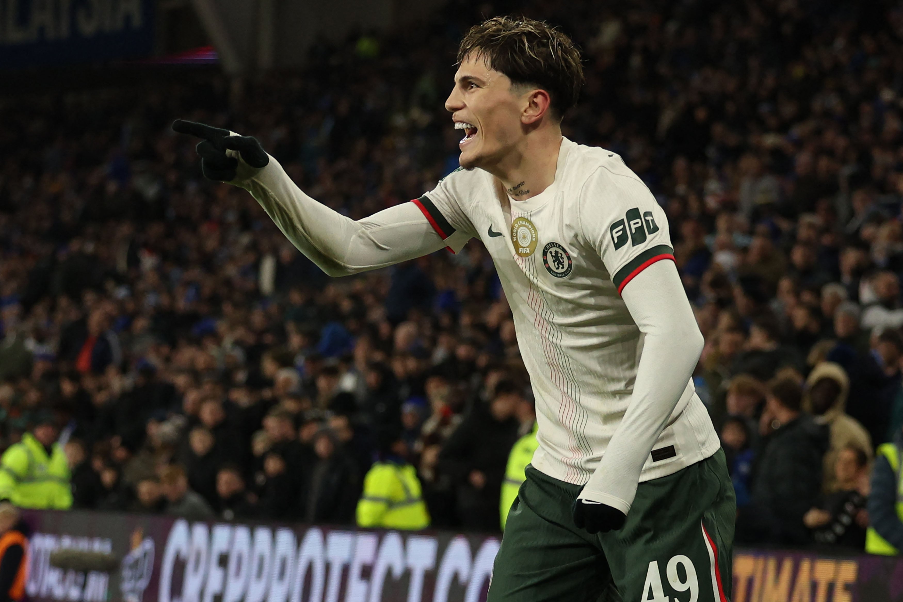 Chelsea's Argentinian midfielder #19 Alejandro Garnacho celebrates after scoring their third goal during the English League Cup quarter-final football match between Cardiff City and Chelsea at Cardiff City Stadium, in Cardiff, south Wales on December 16, 2025. (Photo by Adrian Dennis / AFP) / RESTRICTED TO EDITORIAL USE. NO USE WITH UNAUTHORIZED AUDIO, VIDEO, DATA, FIXTURE LISTS, CLUB/LEAGUE LOGOS OR 'LIVE' SERVICES. ONLINE IN-MATCH USE LIMITED TO 120 IMAGES. AN ADDITIONAL 40 IMAGES MAY BE USED IN EXTRA TIME. NO VIDEO EMULATION. SOCIAL MEDIA IN-MATCH USE LIMITED TO 120 IMAGES. AN ADDITIONAL 40 IMAGES MAY BE USED IN EXTRA TIME. NO USE IN BETTING PUBLICATIONS, GAMES OR SINGLE CLUB/LEAGUE/PLAYER PUBLICATIONS. /