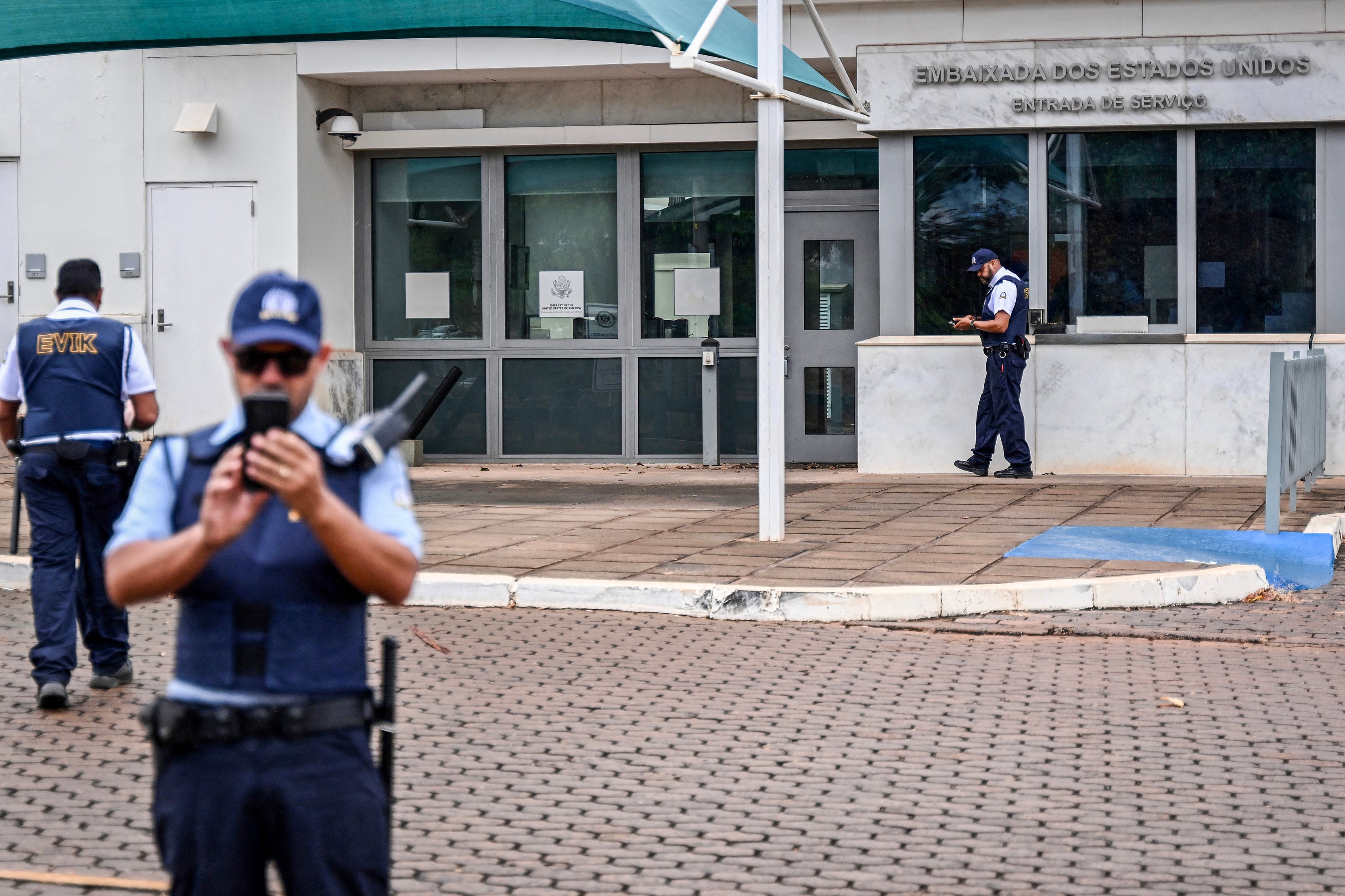 Security personnel stand outside the US Embassy in Brazilia, Brazil, on October 2, 2026, after the United States suspended consular services due to "security concerns"