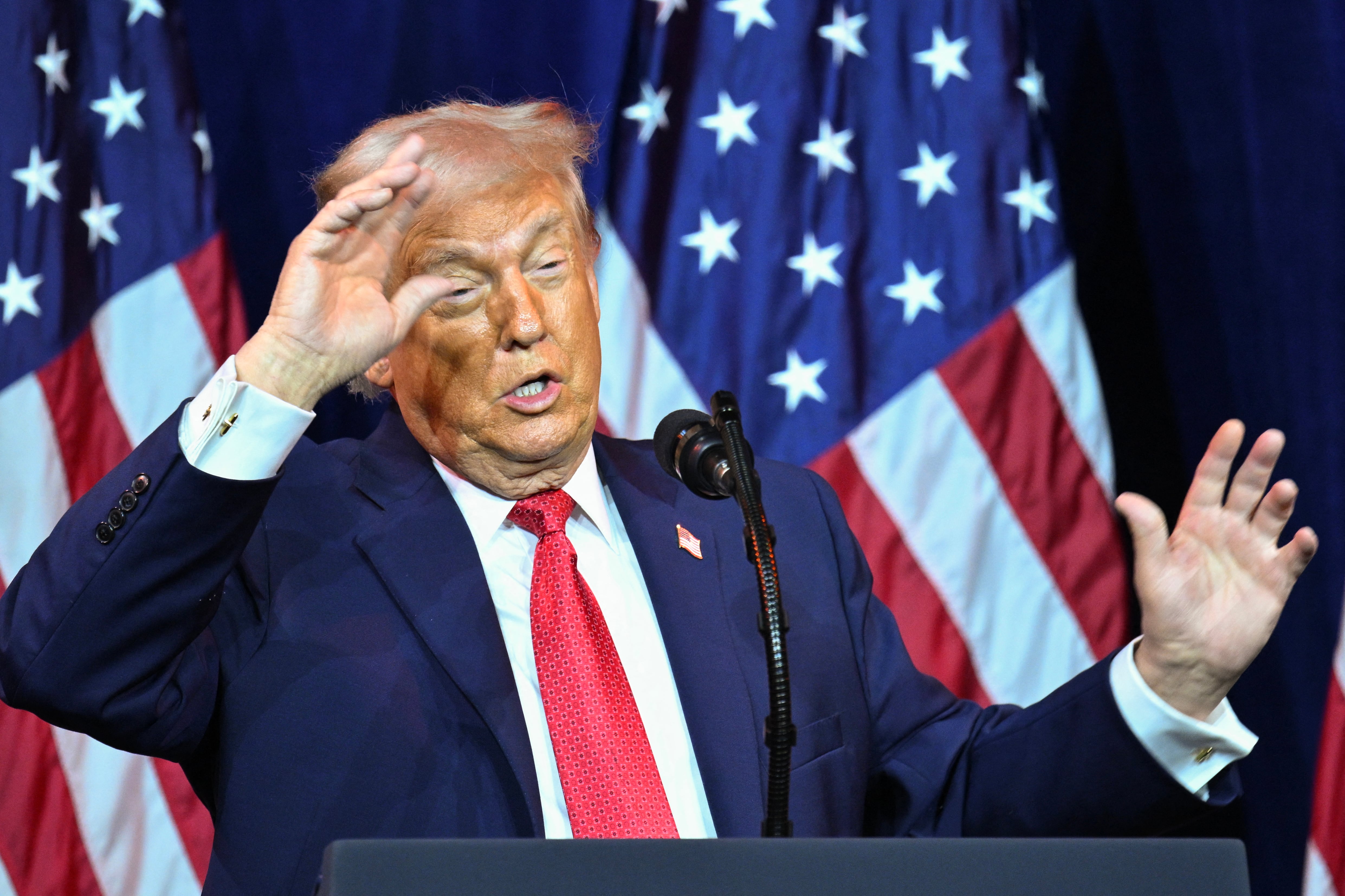 US President Donald Trump reacts as he speaks during the House Republican Party (GOP) member retreat at the Kennedy Center in Washington, DC, on January 6, 2026. (Photo by Mandel NGAN / AFP)