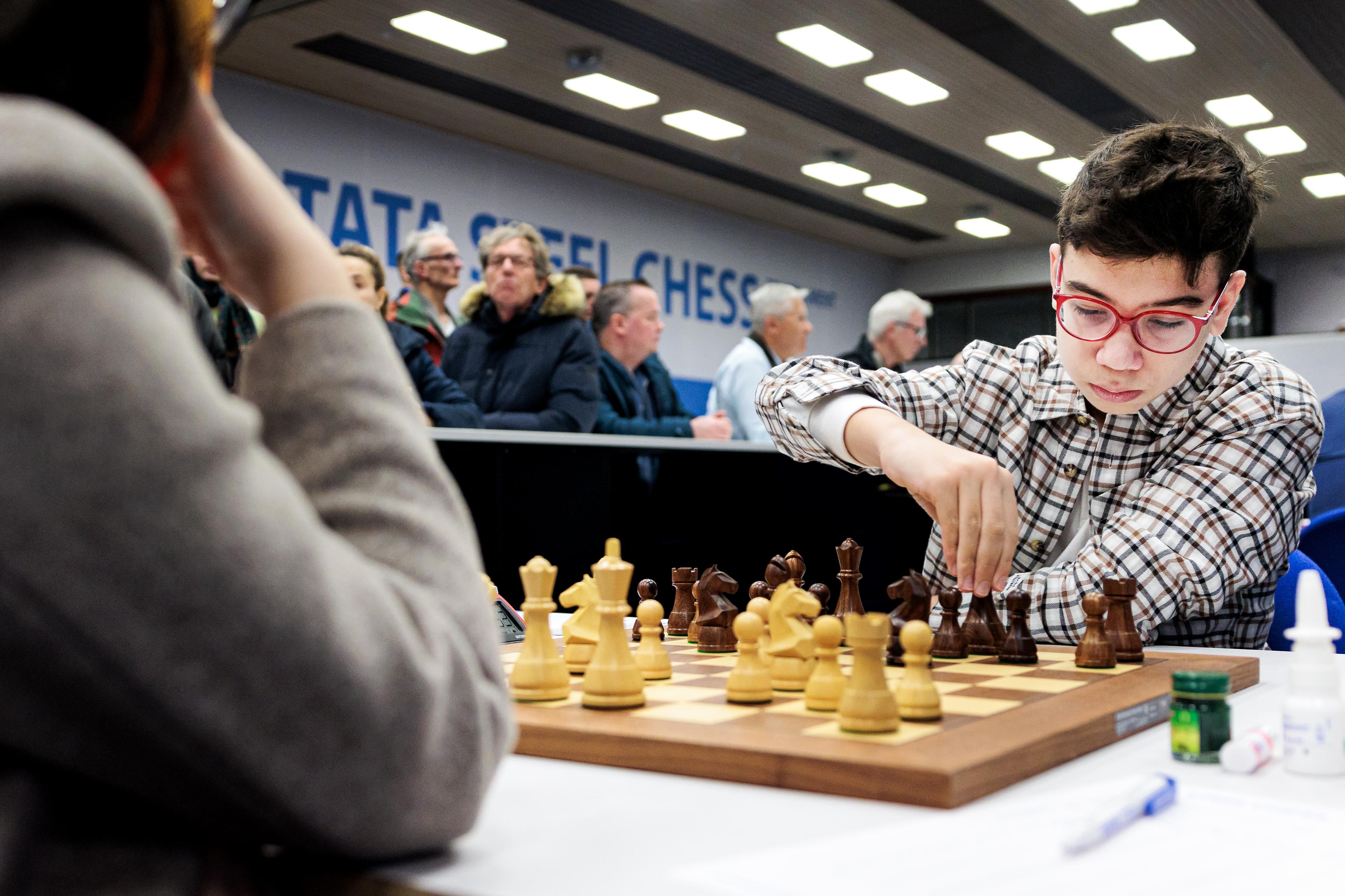 Wijk aan Zee (Netherlands), 21/01/2026.- Argentina's 12-year-old Faustino Oro plays chess during his match against Chinese Lu Miaoyi at the Tata Steel Masters chess tournament in Wijk aan Zee, Netherlands, 21 January 2026. This is the 88th annual chess tournament, formerly known as Hoogovens Tournament from its creation in 1938. (Países Bajos; Holanda) EFE/EPA/RAMON VAN FLYMEN