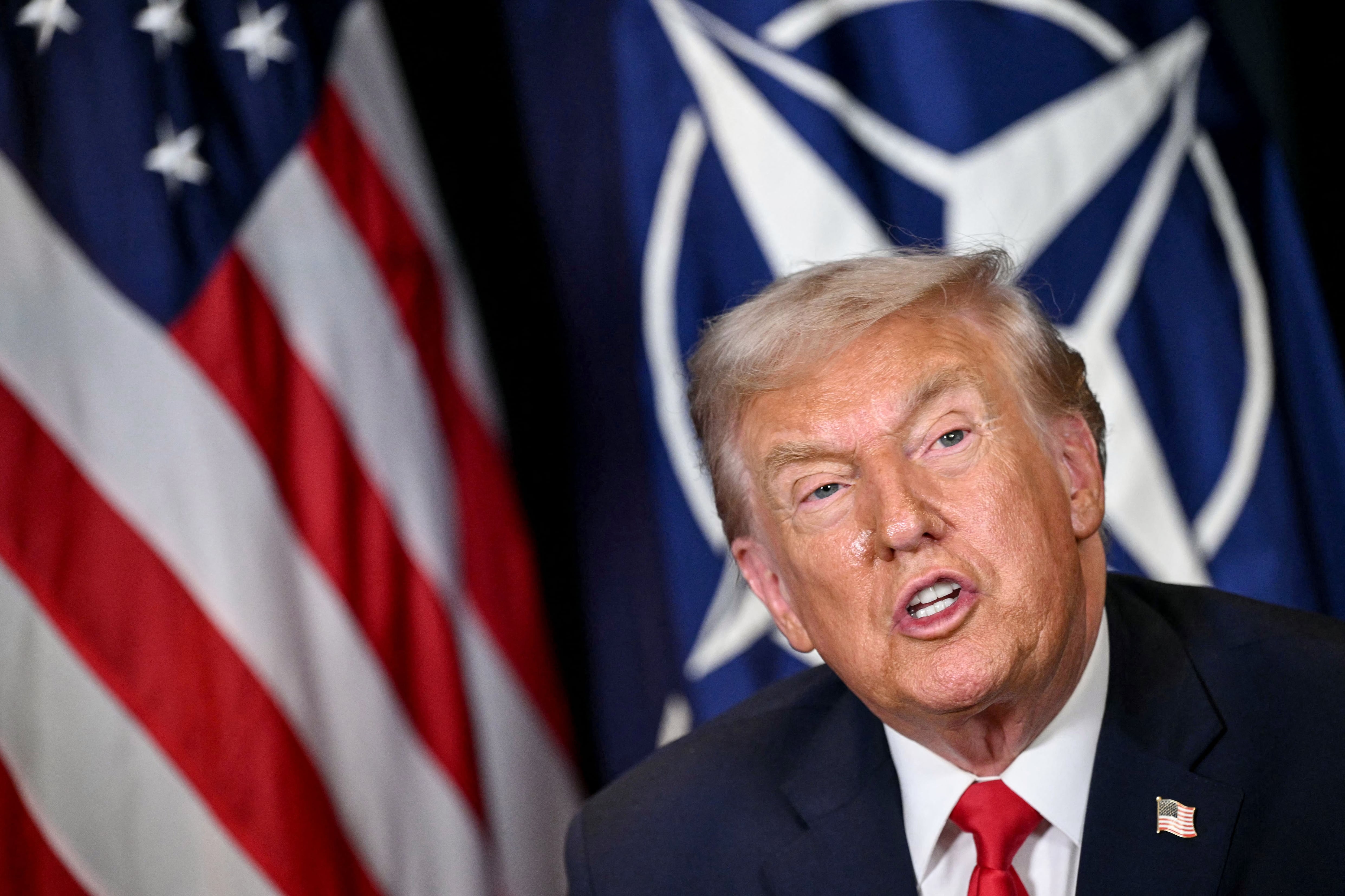 US President Donald Trump speaks during a bilateral meeting with NATO’s Secretary-General on the sidelines of the World Economic Forum (WEF) annual meeting in Davos on January 21, 2026. The World Economic Forum takes place in Davos from January 19 to January 23, 2026. (Photo by Mandel NGAN / AFP)