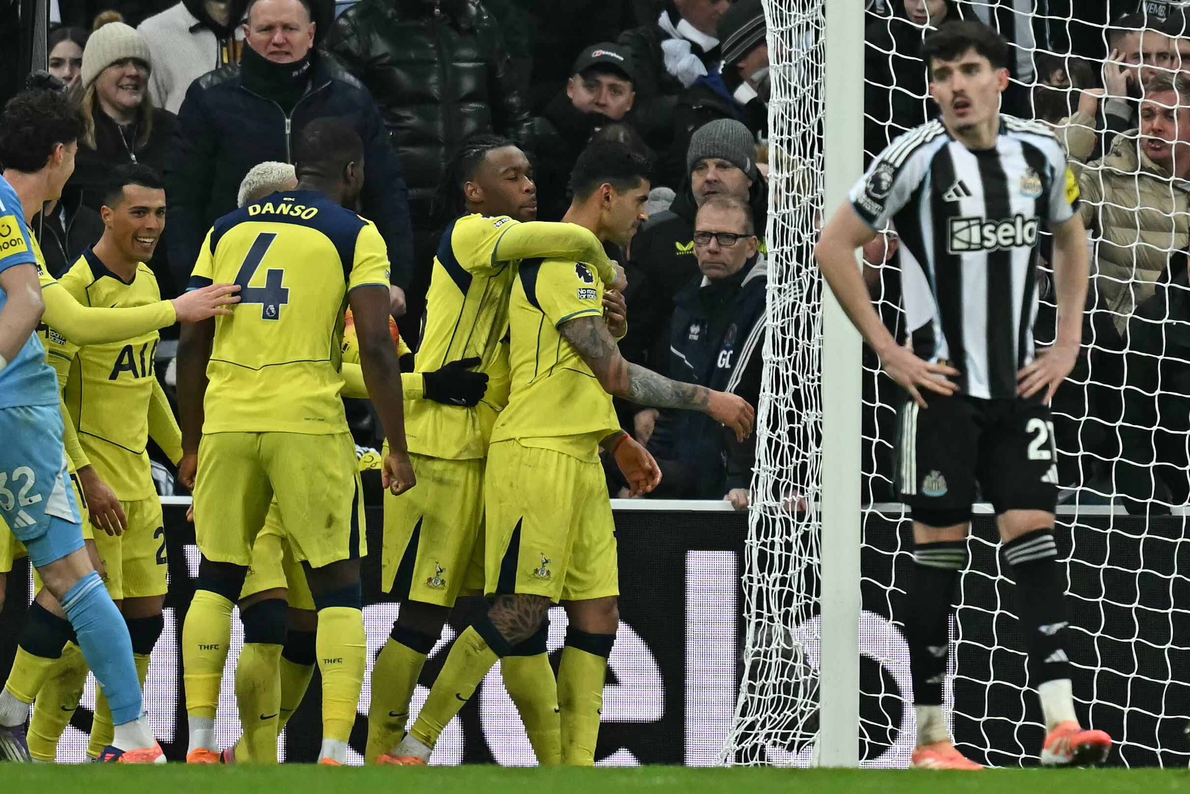 Tottenham Hotspur's Argentinian defender #17 Cristian Romero (2R) celebrates with teammates after scoring their late second goal during the English Premier League football match between Newcastle United and Tottenham Hotspur at St James' Park in Newcastle-upon-Tyne, north east England on December 2, 2025. (Photo by Paul ELLIS / AFP) / RESTRICTED TO EDITORIAL USE. NO USE WITH UNAUTHORIZED AUDIO, VIDEO, DATA, FIXTURE LISTS, CLUB/LEAGUE LOGOS OR 'LIVE' SERVICES. ONLINE IN-MATCH USE LIMITED TO 120 IMAGES. AN ADDITIONAL 40 IMAGES MAY BE USED IN EXTRA TIME. NO VIDEO EMULATION. SOCIAL MEDIA IN-MATCH USE LIMITED TO 120 IMAGES. AN ADDITIONAL 40 IMAGES MAY BE USED IN EXTRA TIME. NO USE IN BETTING PUBLICATIONS, GAMES OR SINGLE CLUB/LEAGUE/PLAYER PUBLICATIONS. /