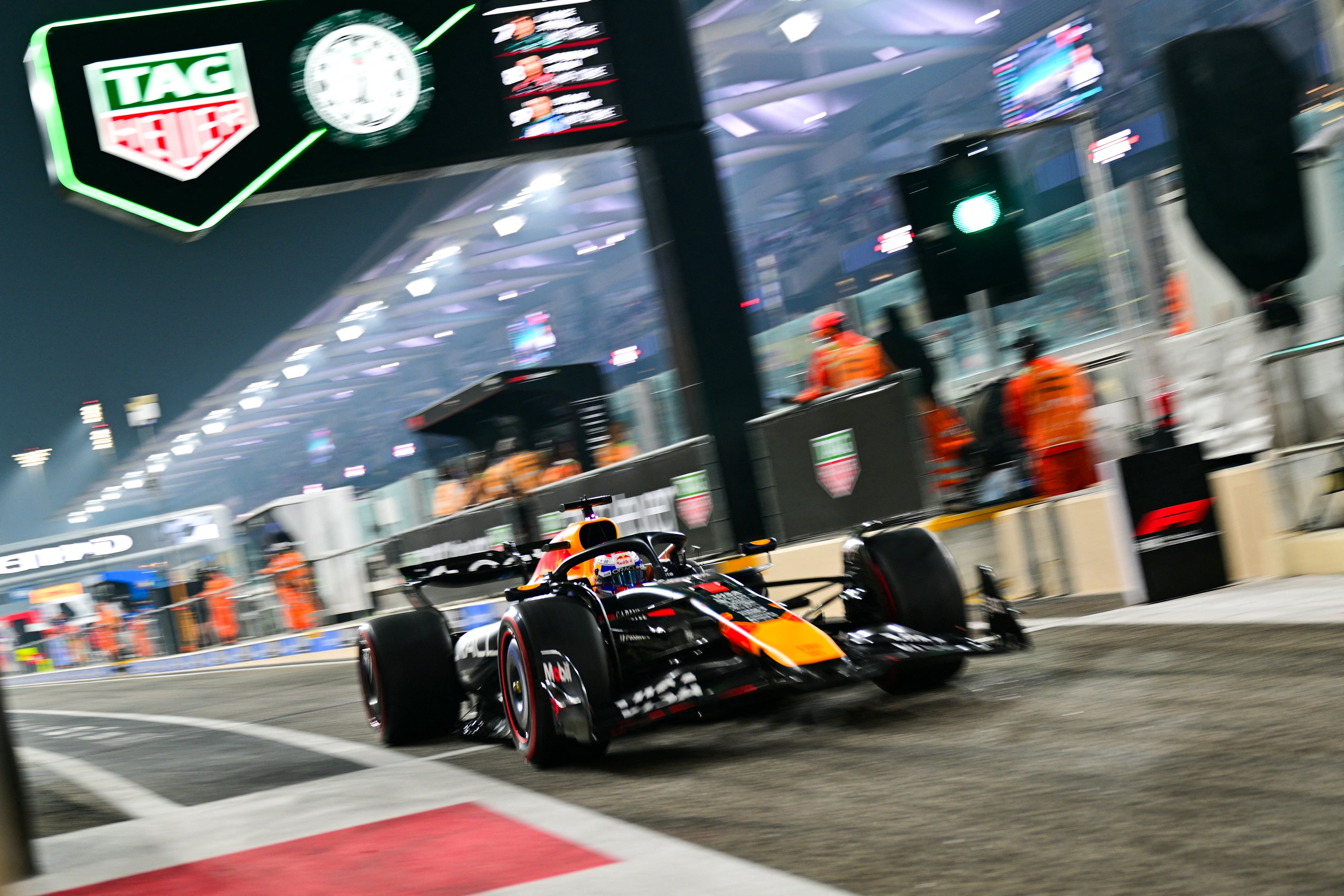 Red Bull Racing's Dutch driver Max Verstappen drives out of the pit lane during the qualifying session ahead of the Abu Dhabi Formula One Grand Prix at the Yas Marina Circuit in Abu Dhabi on December 6, 2025. (Photo by Andrej ISAKOVIC / AFP)
