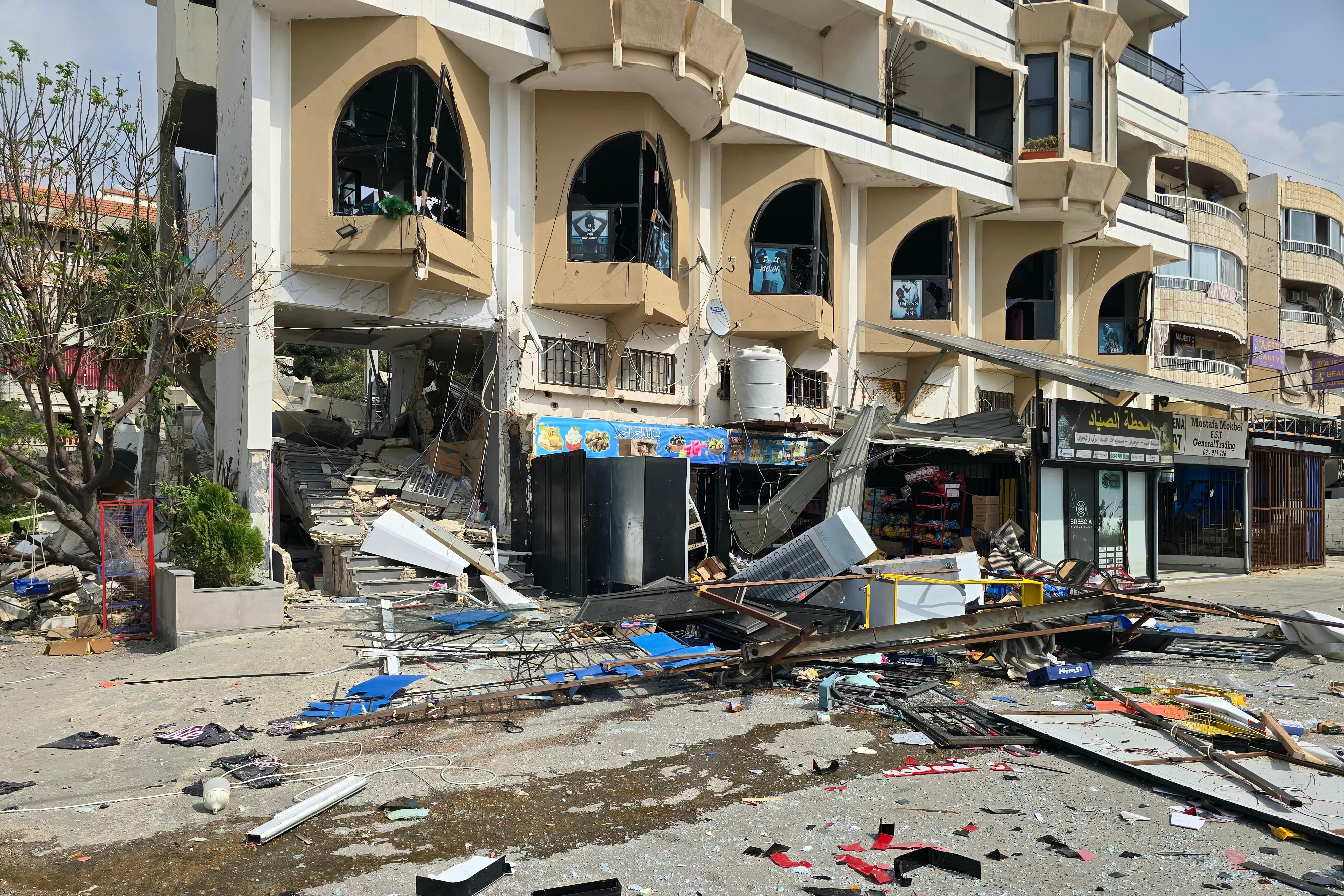This photograph shows the destruction after an Israeli airstrike that targeted the southern coastal city of Tyre’s Al Hosh neighborhood, on March 19, 2026. Lebanon was drawn into the Middle East war on March 2 when militant group Hezbollah launched rockets towards Israel to avenge the killing of Iran's supreme leader Ayatollah Ali Khamenei. Israel responded with intense strikes on Lebanon that have killed at least 968 people and displaced over a million, according to local authorities, and by launching ground operations in the south. (Photo by KAWNAT HAJU / AFP)