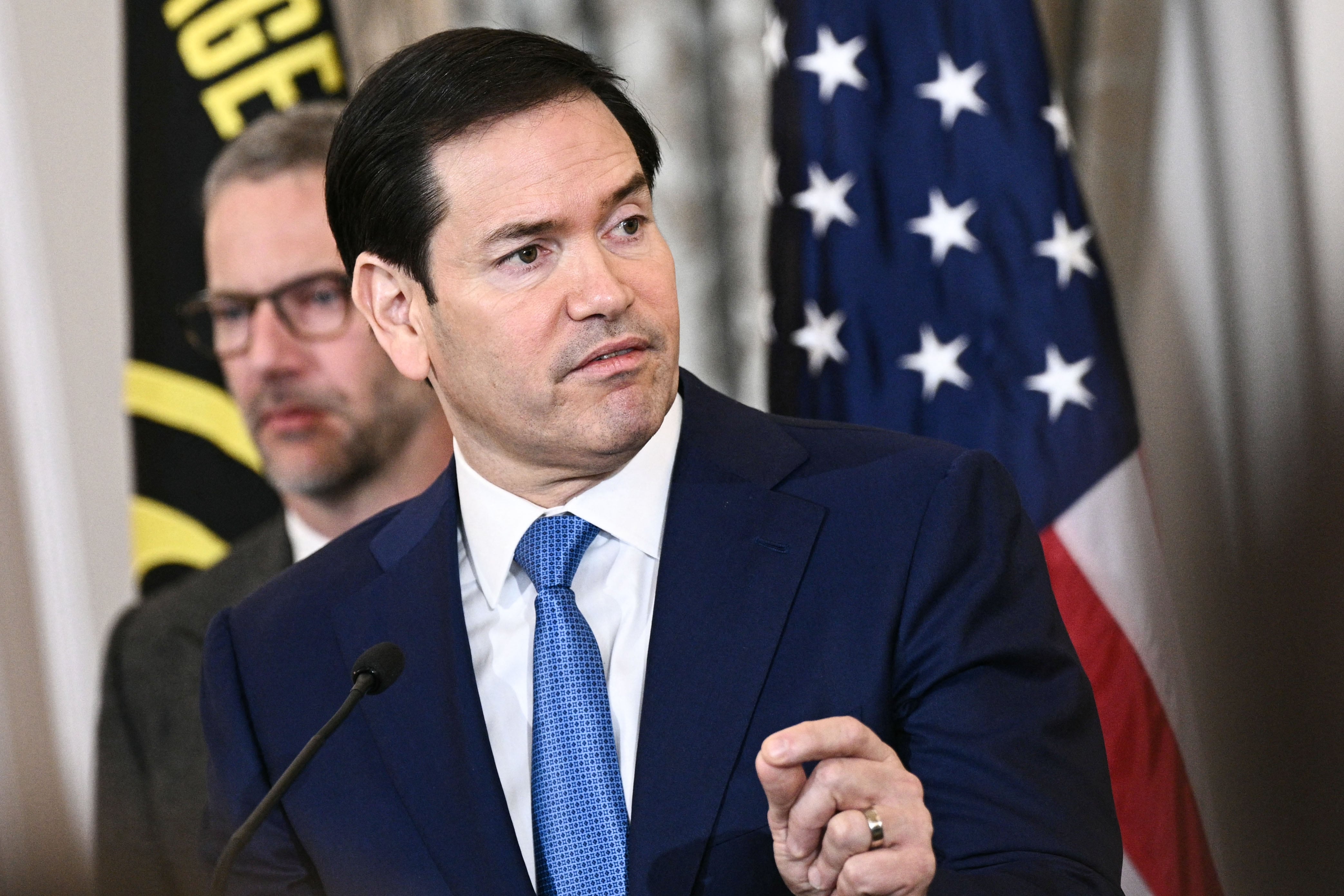 US Secretary of State Marco Rubio delivers remarks at the US Hostage and Wrongful Detainee flag raising ceremony at the State Department in Washington, DC, on March 9, 2026. (Photo by Brendan SMIALOWSKI / AFP)