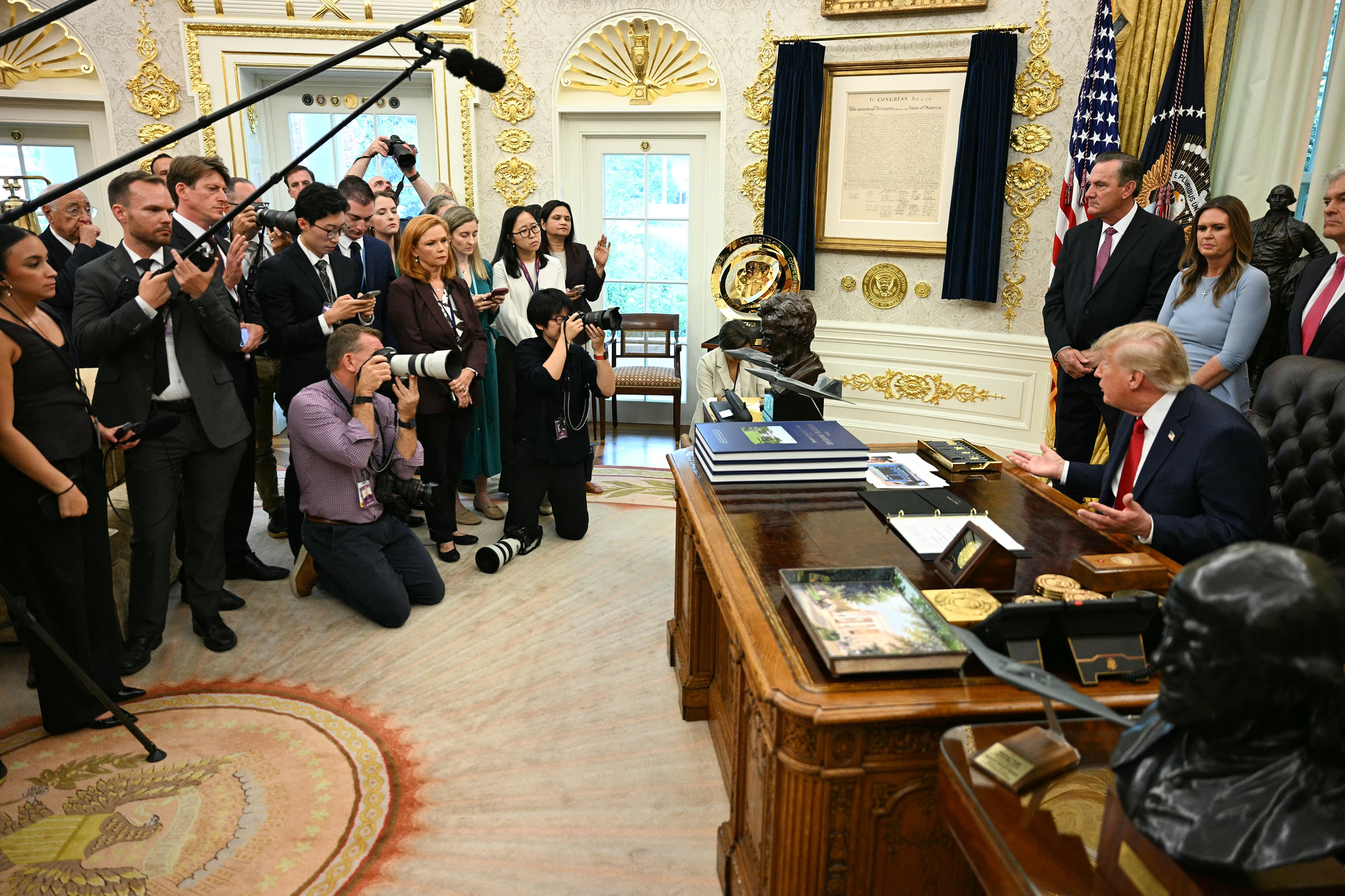 US President Donald Trump takes questions from reporters in the Oval Office of the White House in Washington, DC, on September 18, 2026