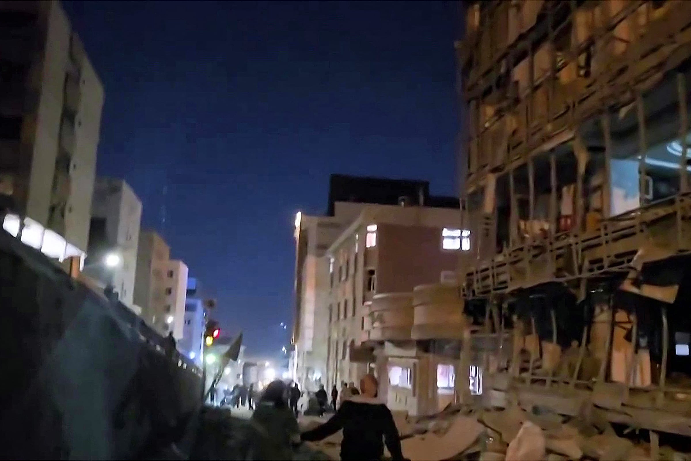 This video grab taken from UGC images posted on social media on March 1, 2026 shows damage near Gandhi Hospital in Tehran. The United States and Israel launched strikes against Iran on February 28, with Israel's public broadcaster reporting that the Iranian supreme leader had been targeted, as the Islamic republic retaliated with barrages of missiles at Gulf states and Israel. (Photo by UGC / AFP) / NO USE AFTER MARCH 16, 2026 20:56:18 GMT - RESTRICTED TO EDITORIAL USE - MANDATORY CREDIT AFP - SOURCE: UGC / UNKNOWN - DISTRIBUTED AS A SERVICE TO CLIENTS - NO RESALE -